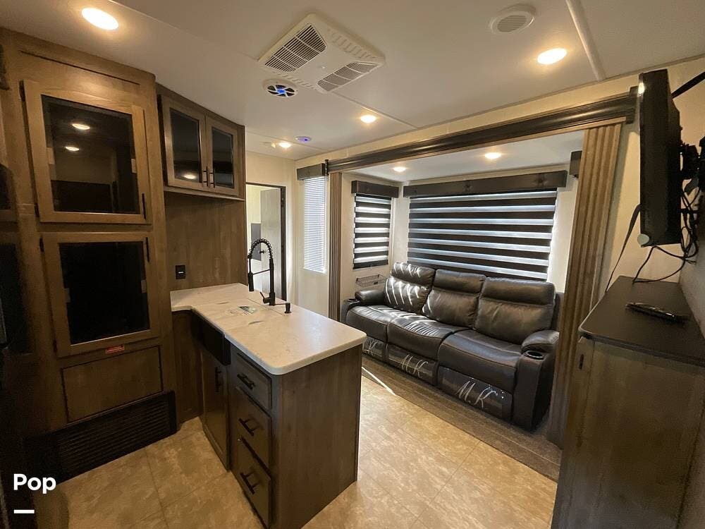 2022 Forest River Rogue 32V - Used Toy Hauler For Sale by Pop RVs in Rutherfordton, North Carolina features Slideout, Awning, Leveling Jacks, Air Conditioning