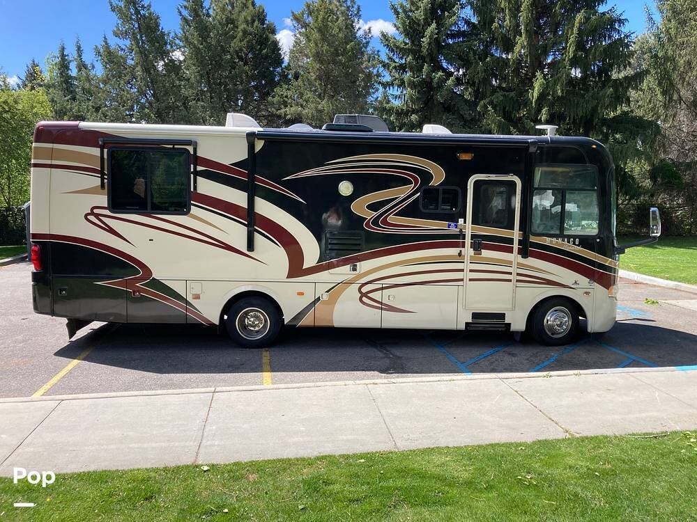 2011 Monaco RV Monarch 30SFS - Used Class A For Sale by Pop RVs in Boise, Idaho features Air Conditioning, Generator, Slideout, Leveling Jacks, Awning