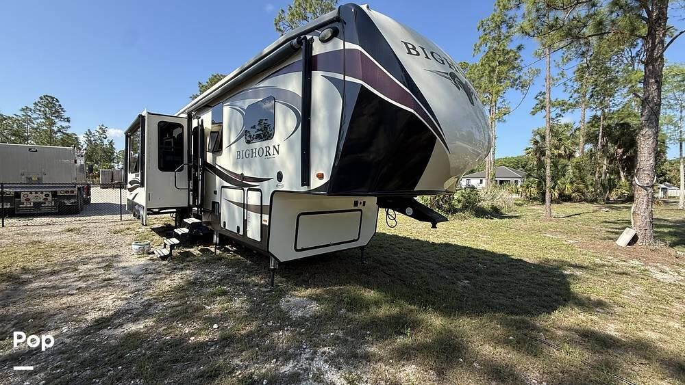 2018 Heartland Bighorn 3160EL - Used Fifth Wheel For Sale by Pop RVs in Naples, Florida features Air Conditioning, Awning, Slideout, Leveling Jacks