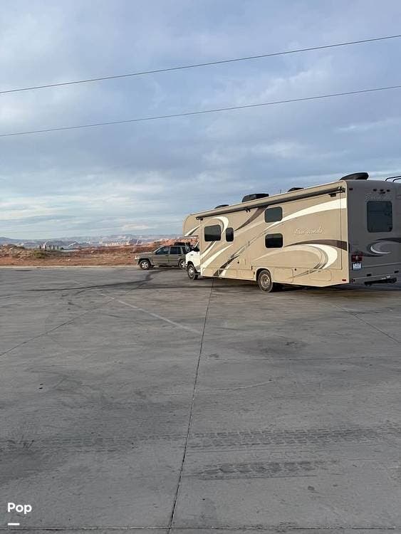 2015 Thor Motor Coach Four Winds 31E - Used Class C For Sale by Pop RVs in Apache Junction, Arizona features Slideout