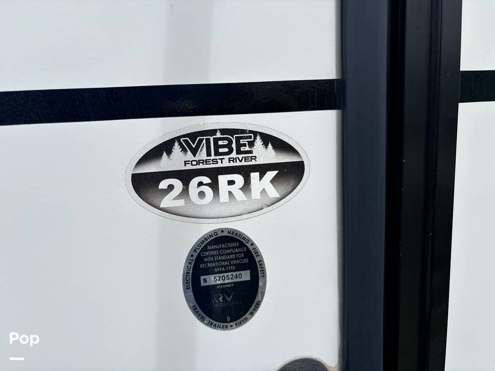 2020 Forest River Vibe 26RK - Used Travel Trailer For Sale by Pop RVs in Rockport, Texas features Slideout, Air Conditioning, Awning, Leveling Jacks