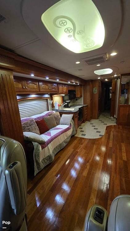 2007 Country Coach Allure 470 Series Siskiyou Summit 400 Quad Slide - Used Diesel Pusher For Sale by Pop RVs in Trenton, Florida features Air Conditioning, Leveling Jacks, Slideout, Generator, Awning