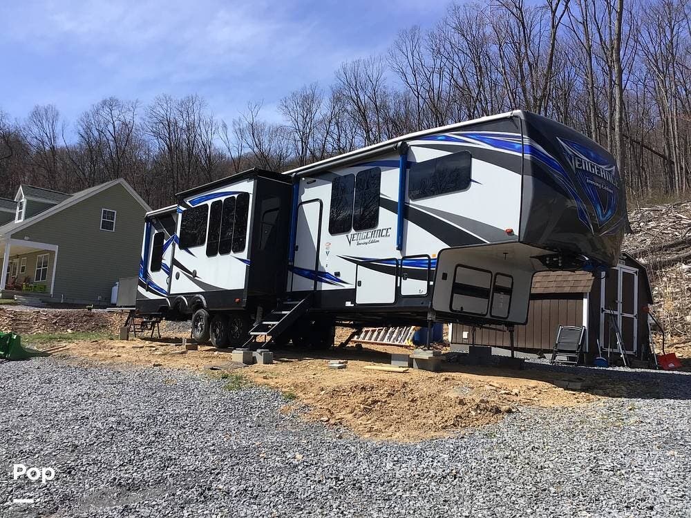 2019 Forest River Vengeance 381L12-6 - Used Toy Hauler For Sale by Pop RVs in Hedgesville, West Virginia features Leveling Jacks, Slideout, Generator, Air Conditioning, Awning