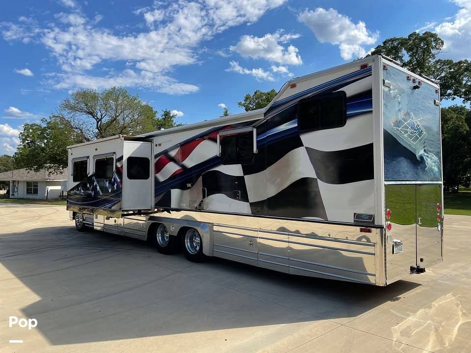 2001 Kingsley Coach Kingsley 46 Custom - Used Toy Hauler For Sale by Pop RVs in Burleson, Texas features Air Conditioning, Generator, Slideout, Awning