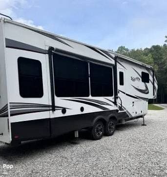 2022 Grand Design Solitude 310 GK - Used Fifth Wheel For Sale by Pop RVs in Harrington, Delaware features Awning, Slideout, Air Conditioning, Leveling Jacks