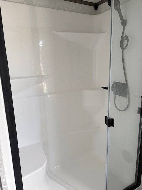 2025 Keystone Residence 401CLDL - Used Travel Trailer For Sale by Pop RVs in Johnson City, Texas features Slideout, Air Conditioning, Awning, Leveling Jacks