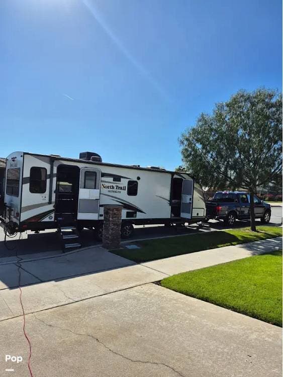 2020 Heartland North Trail 25LRSS - Used Travel Trailer For Sale by Pop RVs in Upland, California features Air Conditioning, Awning, Slideout
