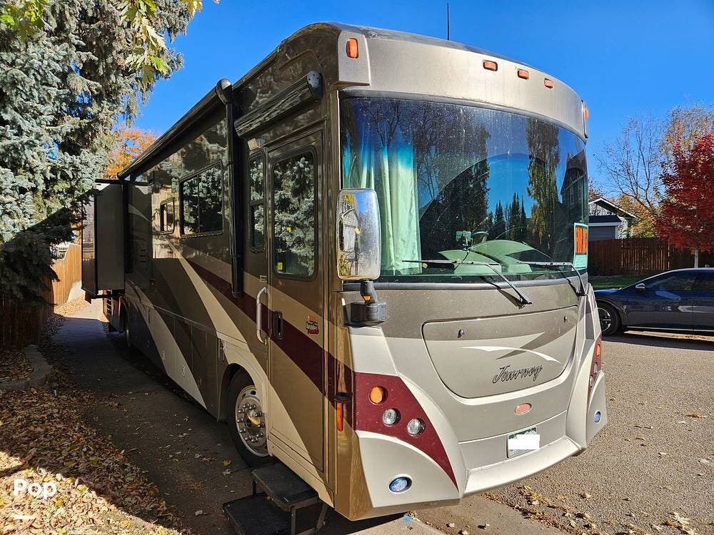 2009 Winnebago Journey 37H - Used Diesel Pusher For Sale by Pop RVs in Morrison, Colorado features Generator, Awning, Air Conditioning, Slideout