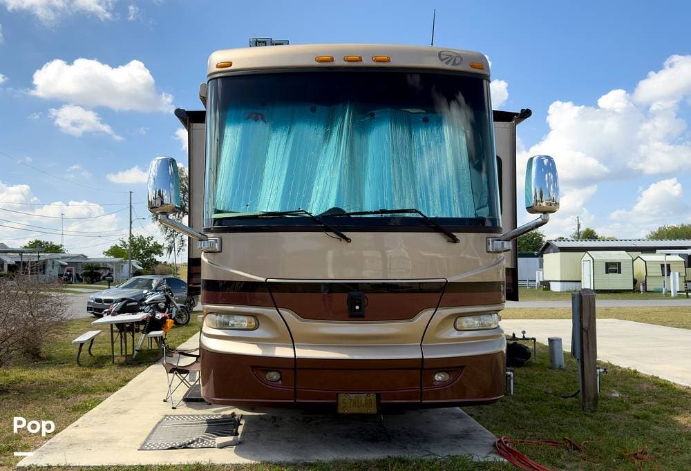 2006 Monaco RV Camelot 42DSQ - Used Diesel Pusher For Sale by Pop RVs in Lake Wales, Florida features Slideout, Leveling Jacks, Awning, Generator, Air Conditioning
