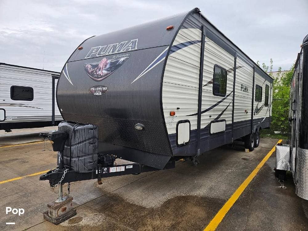 2018 Palomino Puma 32RKTS - Used Travel Trailer For Sale by Pop RVs in Westfield, Indiana features Slideout, Air Conditioning, Awning, Leveling Jacks