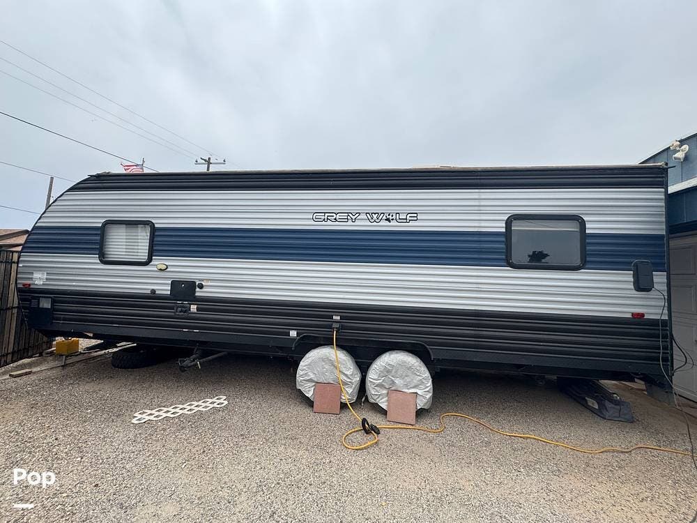 2021 Forest River Grey Wolf 22RR - Used Toy Hauler For Sale by Pop RVs in Buckeye, Arizona features Air Conditioning, Awning, Leveling Jacks