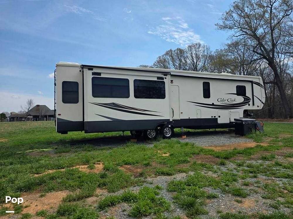 2020 Forest River Cedar Creek Silverback Series M-37MBH - Used Fifth Wheel For Sale by Pop RVs in Monroe, North Carolina features Slideout
