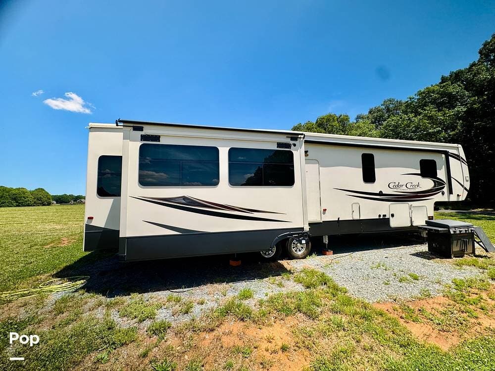 2020 Forest River Cedar Creek 37MBH - Used Fifth Wheel For Sale by Pop RVs in Monroe, North Carolina features Leveling Jacks, Slideout, Awning, Air Conditioning
