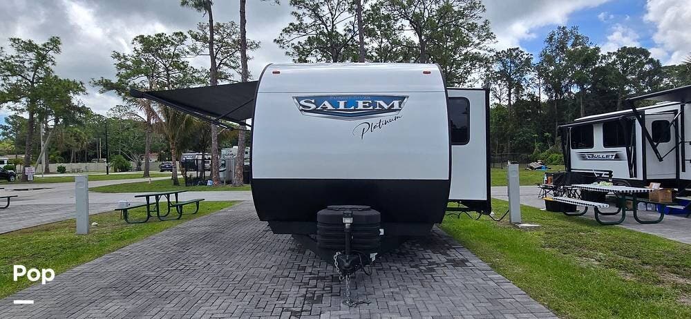 2024 Forest River Salem Platinum 33TS - Used Travel Trailer For Sale by Pop RVs in Jupiter Farms, Florida features Slideout, Air Conditioning, Awning