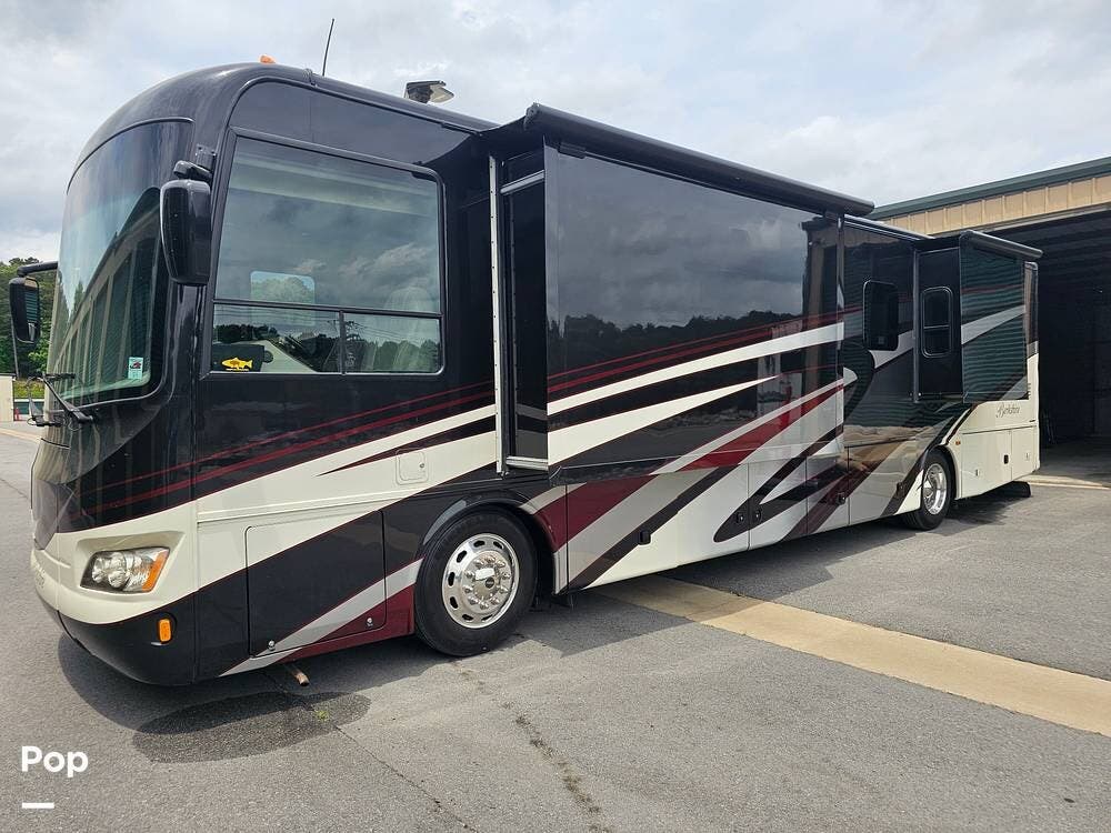 2017 Forest River Berkshire 38A - Used Diesel Pusher For Sale by Pop RVs in Little Rock, Arkansas features Leveling Jacks, Awning, Generator, Slideout, Air Conditioning