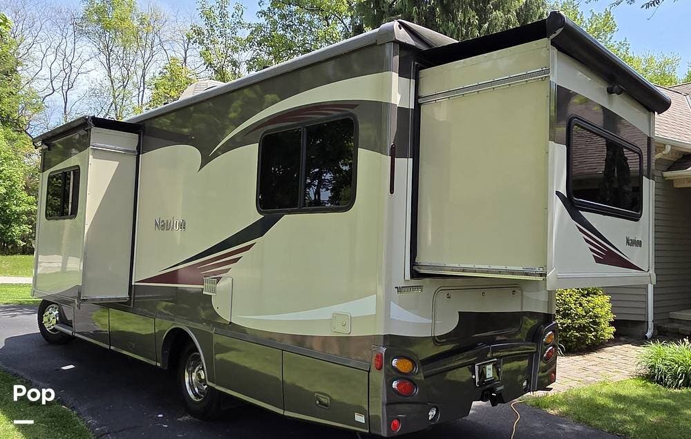 2016 Winnebago Navion 24G - Used Class C For Sale by Pop RVs in Madison, Ohio features Air Conditioning, Generator, Awning, Slideout
