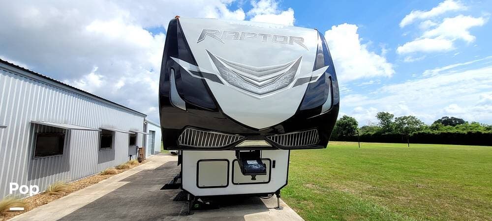 2017 Keystone Raptor 425TS - Used Toy Hauler For Sale by Pop RVs in La Porte, Texas features Leveling Jacks, Generator, Slideout, Awning, Air Conditioning
