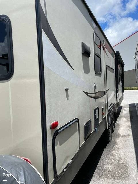 2019 Keystone Cougar 33MLS - Used Travel Trailer For Sale by Pop RVs in Spring Hill, Florida features Slideout, Awning, Air Conditioning