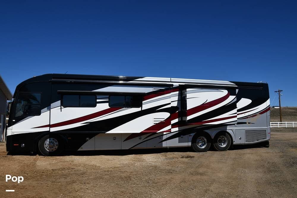 2009 American Coach American Eagle 45E - Used Diesel Pusher For Sale by Pop RVs in Granby, Colorado features Awning, Generator, Air Conditioning, Slideout, Leveling Jacks