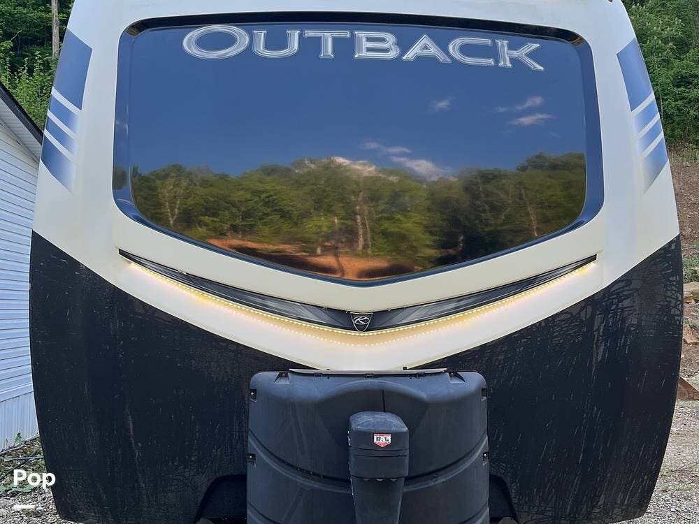 2020 Keystone Outback 324CG - Used Toy Hauler For Sale by Pop RVs in Proctorville, Ohio features Air Conditioning, Slideout, Awning