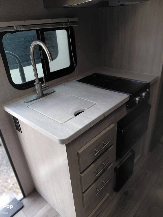 2022 Coachmen Catalina 184BHS - Used Travel Trailer For Sale by Pop RVs in Grand Junction, Colorado features Leveling Jacks, Air Conditioning, Slideout, Awning