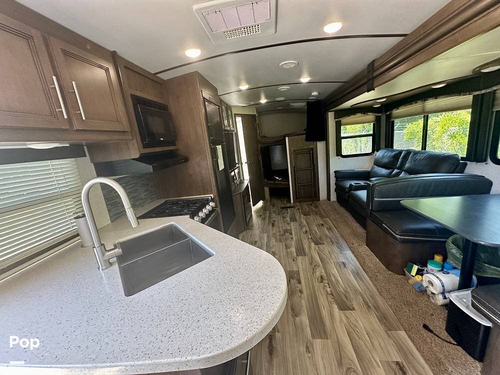 2020 Keystone Cougar 29BHS - Used Travel Trailer For Sale by Pop RVs in Myrtle Beach, South Carolina features Air Conditioning, Leveling Jacks, Slideout, Awning
