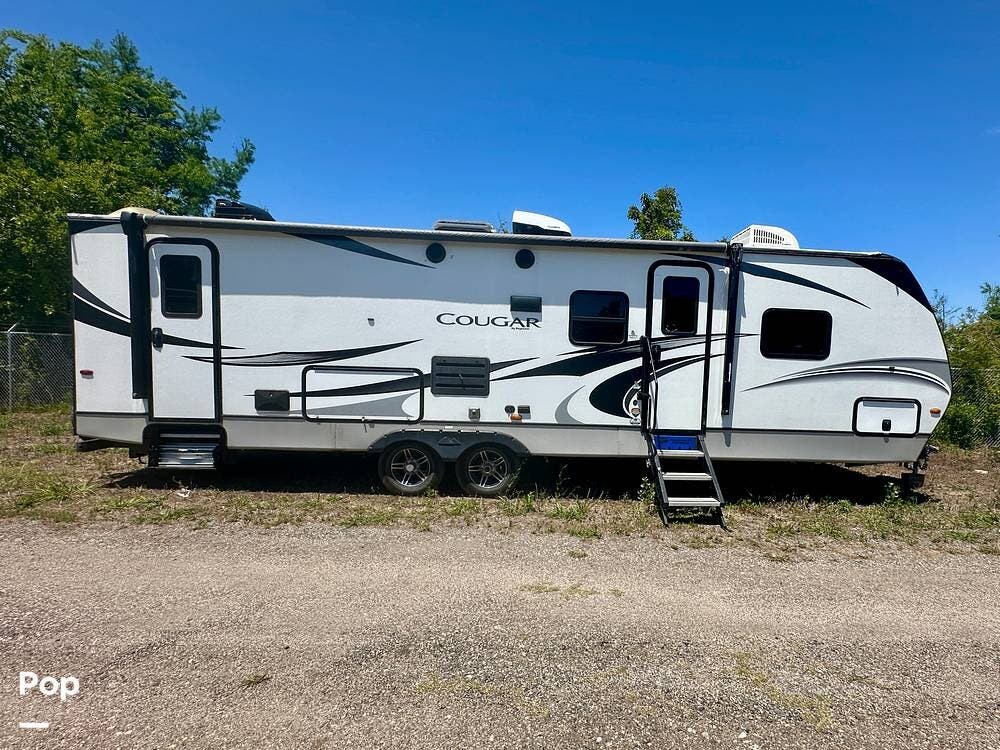2020 Keystone Cougar 29BHS - Used Travel Trailer For Sale by Pop RVs in Myrtle Beach, South Carolina features Air Conditioning, Leveling Jacks, Awning, Slideout