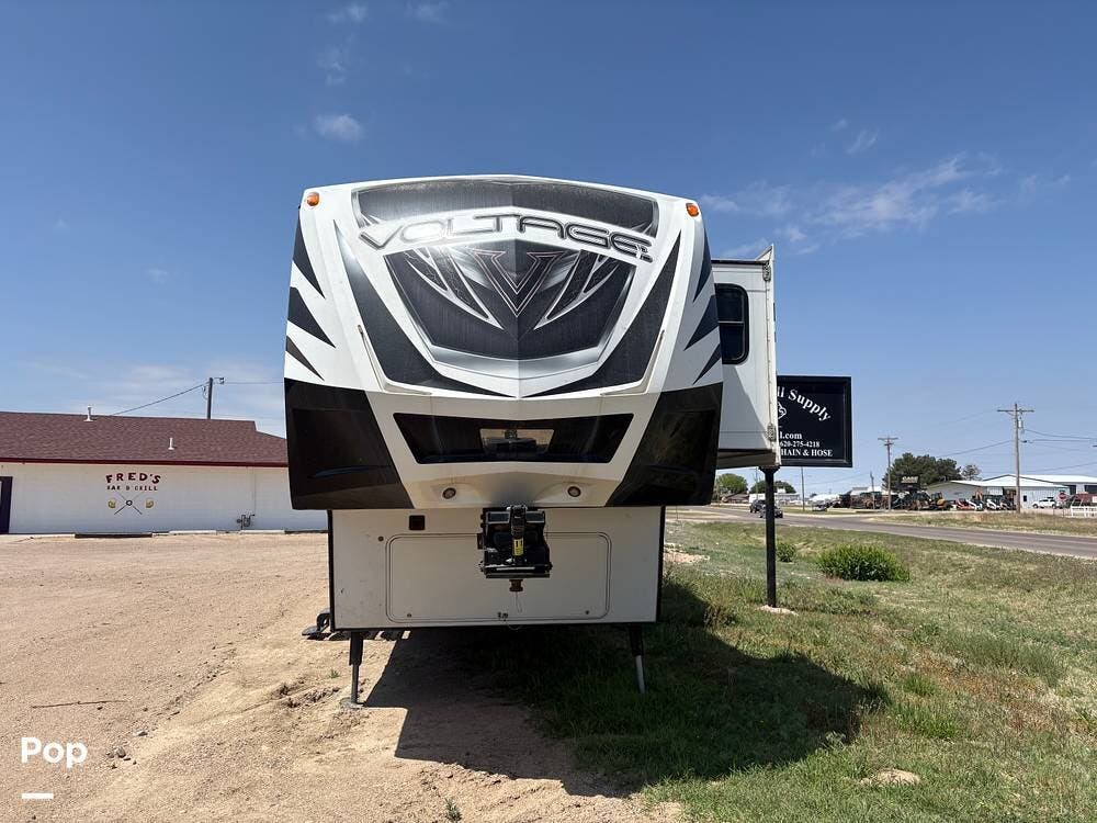 2016 Dutchmen Voltage 3914 - Used Toy Hauler For Sale by Pop RVs in Garden City, Kansas features Slideout, Leveling Jacks, Awning, Generator, Air Conditioning