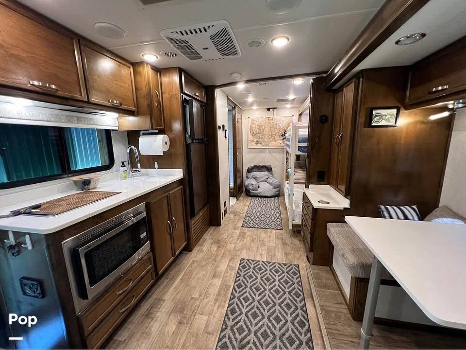 2019 Tiffin Wayfarer 24FW - Used Class C For Sale by Pop RVs in Huntsville, Alabama features Air Conditioning, Slideout, Generator, Leveling Jacks, Awning
