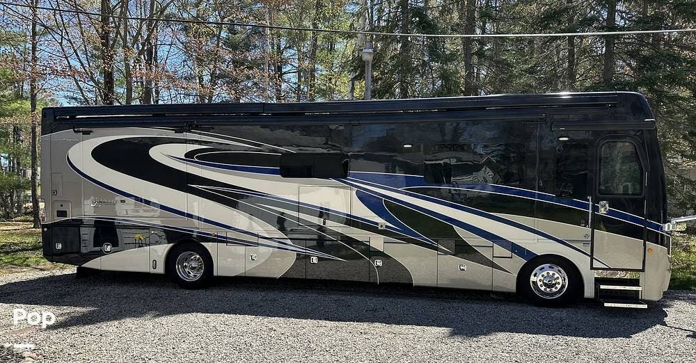 2018 Fleetwood Discovery LXE 39F - Used Diesel Pusher For Sale by Pop RVs in Gladwin, Michigan features Generator, Awning, Air Conditioning, Leveling Jacks, Slideout