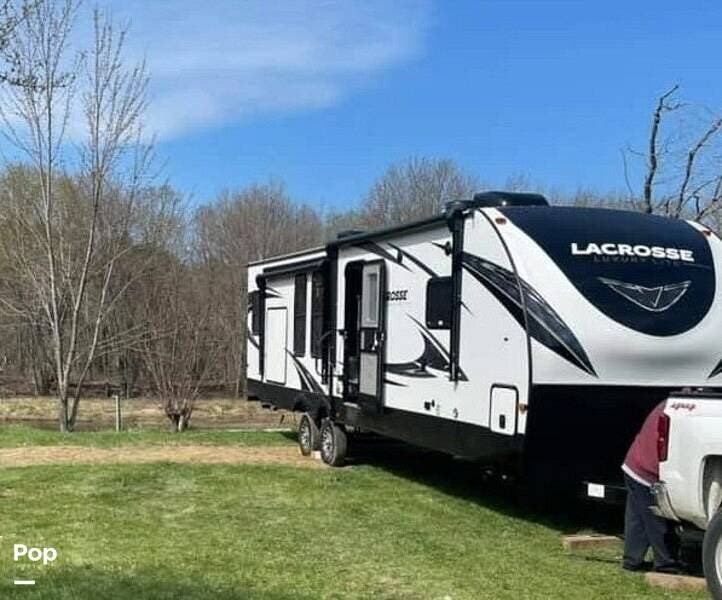 2021 Forest River Lacrosse Luxury Lite 3399SE - Used Travel Trailer For Sale by Pop RVs in Au Sable Forks, New York features Leveling Jacks, Slideout, Awning, Air Conditioning