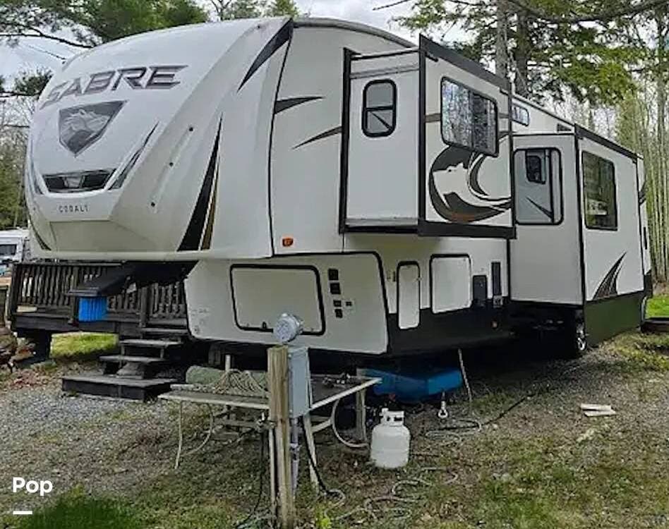 2023 Forest River Sabre 37FLL - Used Fifth Wheel For Sale by Pop RVs in Eddington, Maine features Slideout, Air Conditioning, Awning