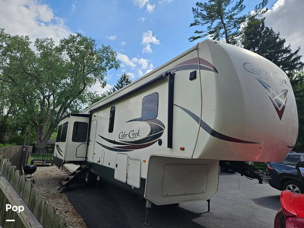 2019 Forest River Cedar Creek 37MBH - Used Fifth Wheel For Sale by Pop RVs in Franlin, Indiana features Air Conditioning, Slideout, Leveling Jacks, Awning