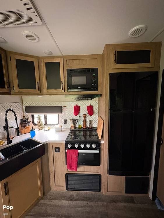 2024 Forest River Wolf Pack 32PACK13 - Used Toy Hauler For Sale by Pop RVs in Grand Forks, North Dakota features Generator, Air Conditioning, Slideout, Awning, Leveling Jacks