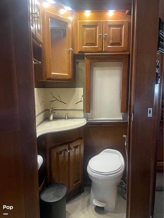 2013 Tiffin Phaeton 40QBH - Used Diesel Pusher For Sale by Pop RVs in Phoenix, Arizona features Leveling Jacks, Slideout, Generator, Air Conditioning
