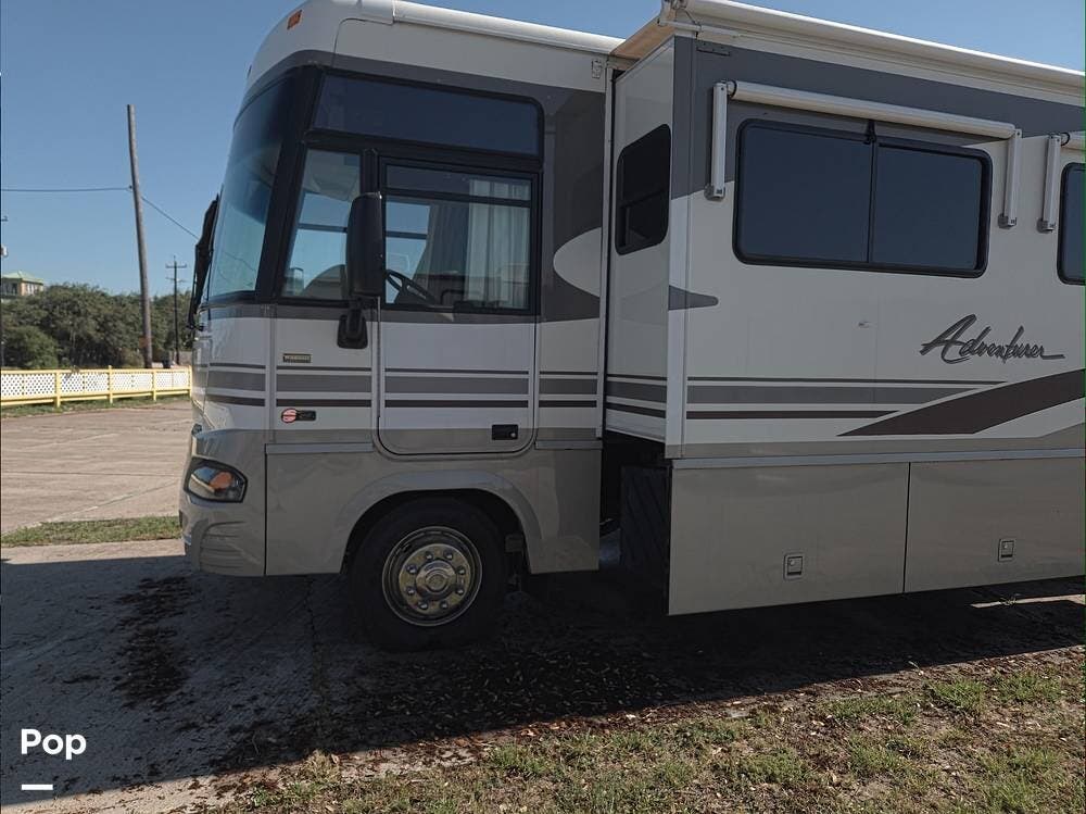 2003 Winnebago Adventurer 35U - Used Class A For Sale by Pop RVs in Rockport, Texas features Leveling Jacks, Generator, Slideout, Air Conditioning, Awning