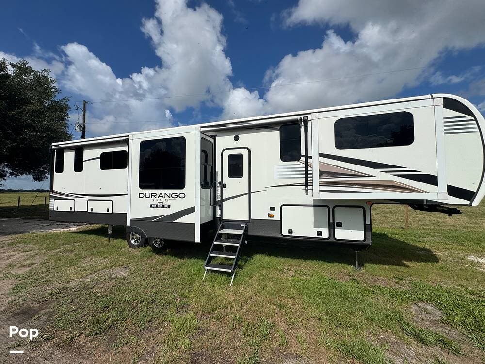 2021 K-Z Durango Gold 387FLF - Used Fifth Wheel For Sale by Pop RVs in Zolfo Springs, Florida features Awning, Leveling Jacks, Air Conditioning, Slideout