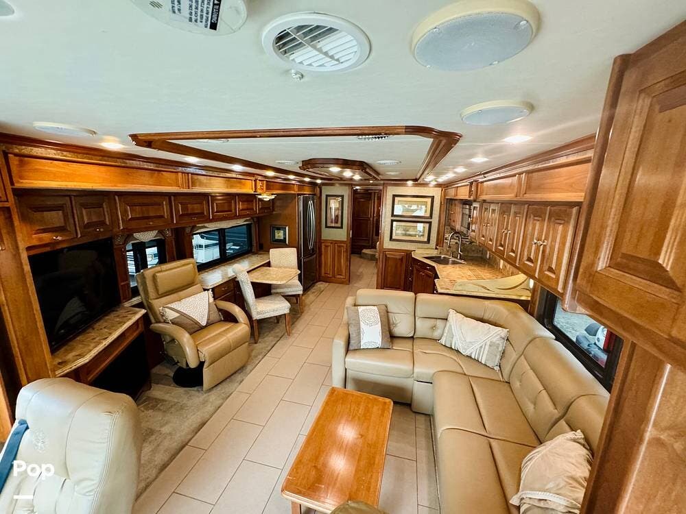 2014 Tiffin Phaeton 36GH - Used Diesel Pusher For Sale by Pop RVs in Charlotte, North Carolina features Generator, Leveling Jacks, Awning, Slideout, Air Conditioning