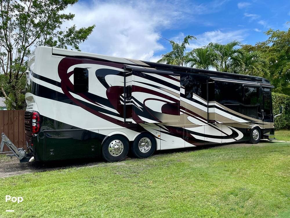 2015 Newmar Essex 4503 - Used Diesel Pusher For Sale by Pop RVs in Miami, Florida features Leveling Jacks, Awning, Generator, Slideout, Air Conditioning