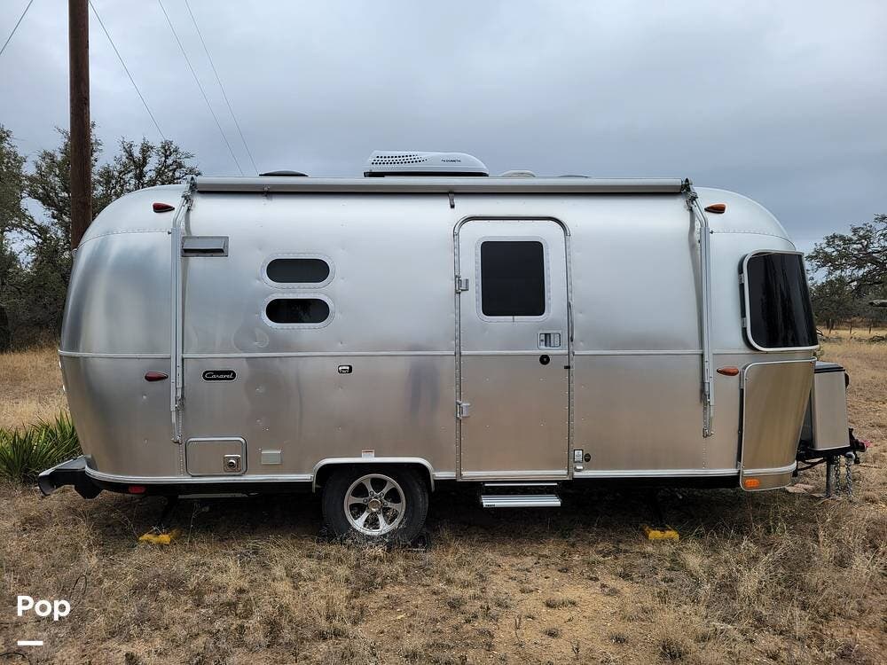 2021 Airstream Caravel 20FB - Used Travel Trailer For Sale by Pop RVs in Bandera, Texas features Awning, Air Conditioning, Leveling Jacks