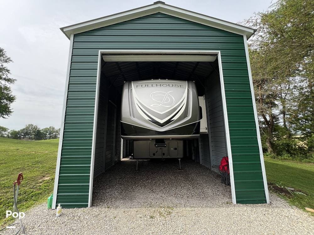 2021 DRV Full House LX455 - Used Toy Hauler For Sale by Pop RVs in Columbus, Indiana features Generator, Air Conditioning, Leveling Jacks, Slideout, Awning