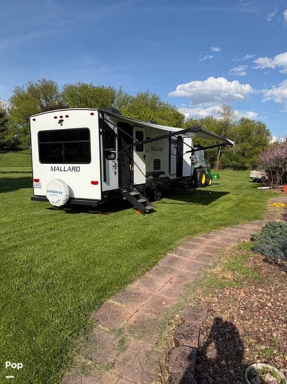 2022 Heartland Mallard M27 - Used Travel Trailer For Sale by Pop RVs in Oneida, New York features Leveling Jacks, Air Conditioning, Awning, Slideout