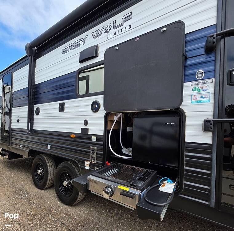 2023 Forest River Grey Wolf 26DBH - Used Travel Trailer For Sale by Pop RVs in Nipomo, California features Air Conditioning, Leveling Jacks, Awning, Slideout
