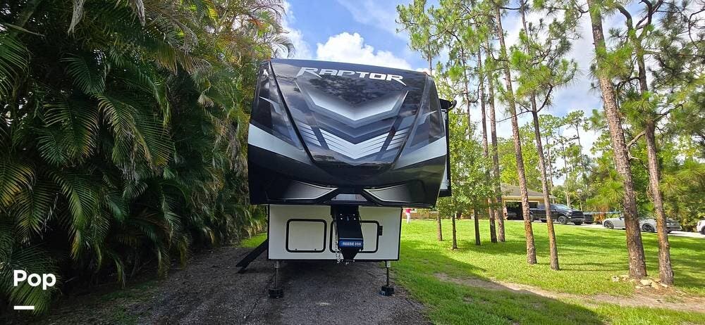 2022 Keystone Raptor 362 - Used Toy Hauler For Sale by Pop RVs in Jupiter, Florida features Generator, Slideout, Awning, Air Conditioning