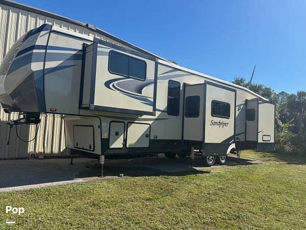 2021 Forest River Sandpiper 38FKOK - Used Fifth Wheel For Sale by Pop RVs in Naples, Florida features Slideout, Leveling Jacks, Awning, Air Conditioning