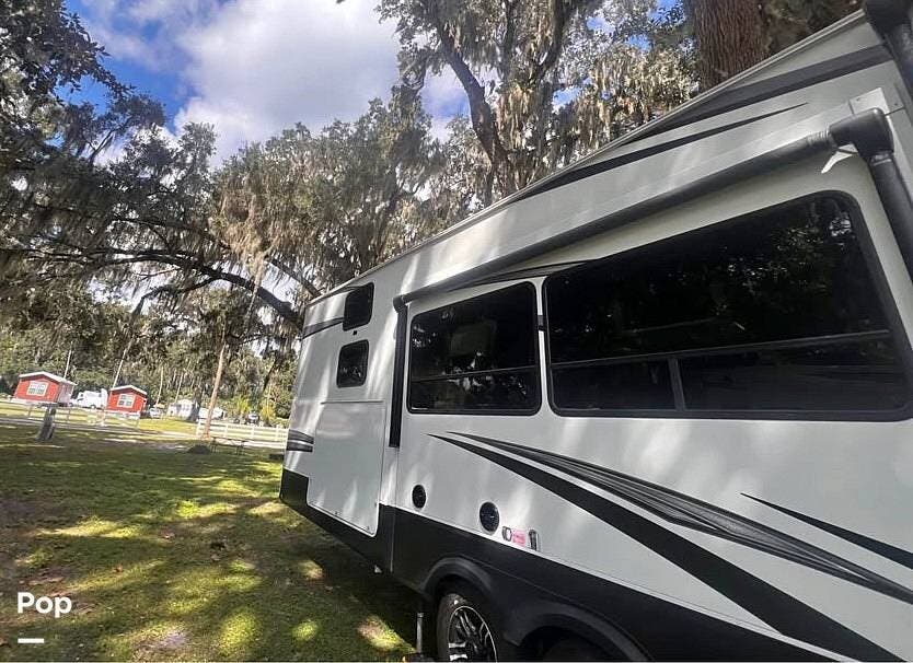 2022 Grand Design Solitude 3950BH - Used Fifth Wheel For Sale by Pop RVs in Saint Augustine, Florida features Slideout