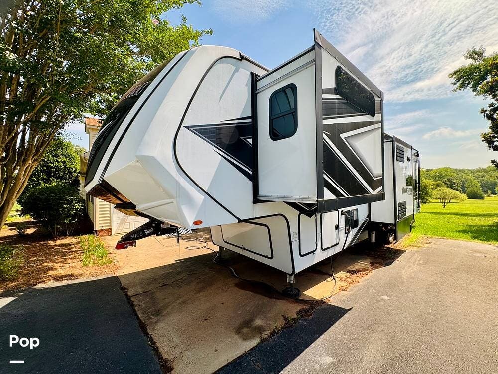 2022 Grand Design Momentum M-Class 351MS - Used Toy Hauler For Sale by Pop RVs in York, South Carolina features Leveling Jacks, Air Conditioning, Awning, Slideout