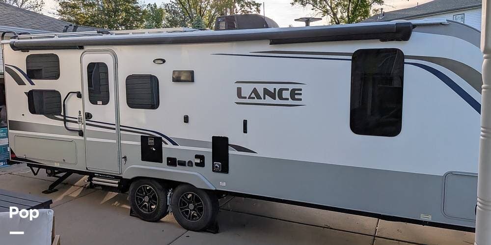 2021 Lance Lance 2445 - Used Travel Trailer For Sale by Pop RVs in Hill Afb, Utah features Slideout, Air Conditioning, Leveling Jacks, Awning