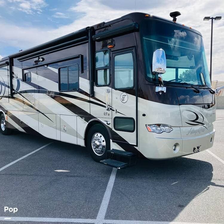 2011 Tiffin Allegro Bus 40QXP - Used Diesel Pusher For Sale by Pop RVs in Pahrump, Nevada features Generator, Slideout, Leveling Jacks, Air Conditioning, Awning