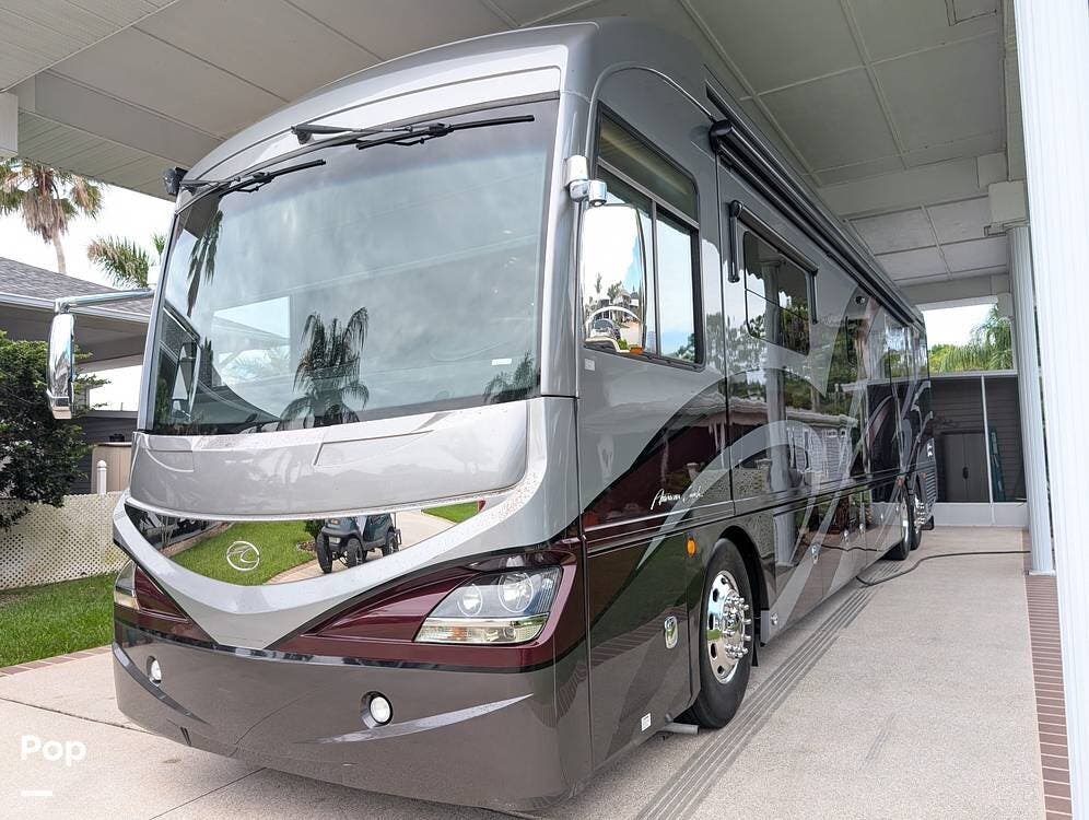 2017 American Coach American Revolution 42Q - Used Diesel Pusher For Sale by Pop RVs in Titusville, Florida features Generator, Awning, Air Conditioning, Leveling Jacks, Slideout